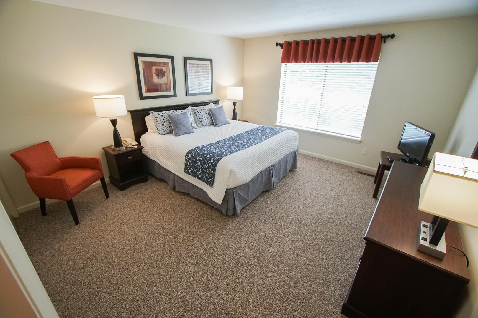 A spacious master bedroom at VRI's Brewster Green Resort in Massachusetts.